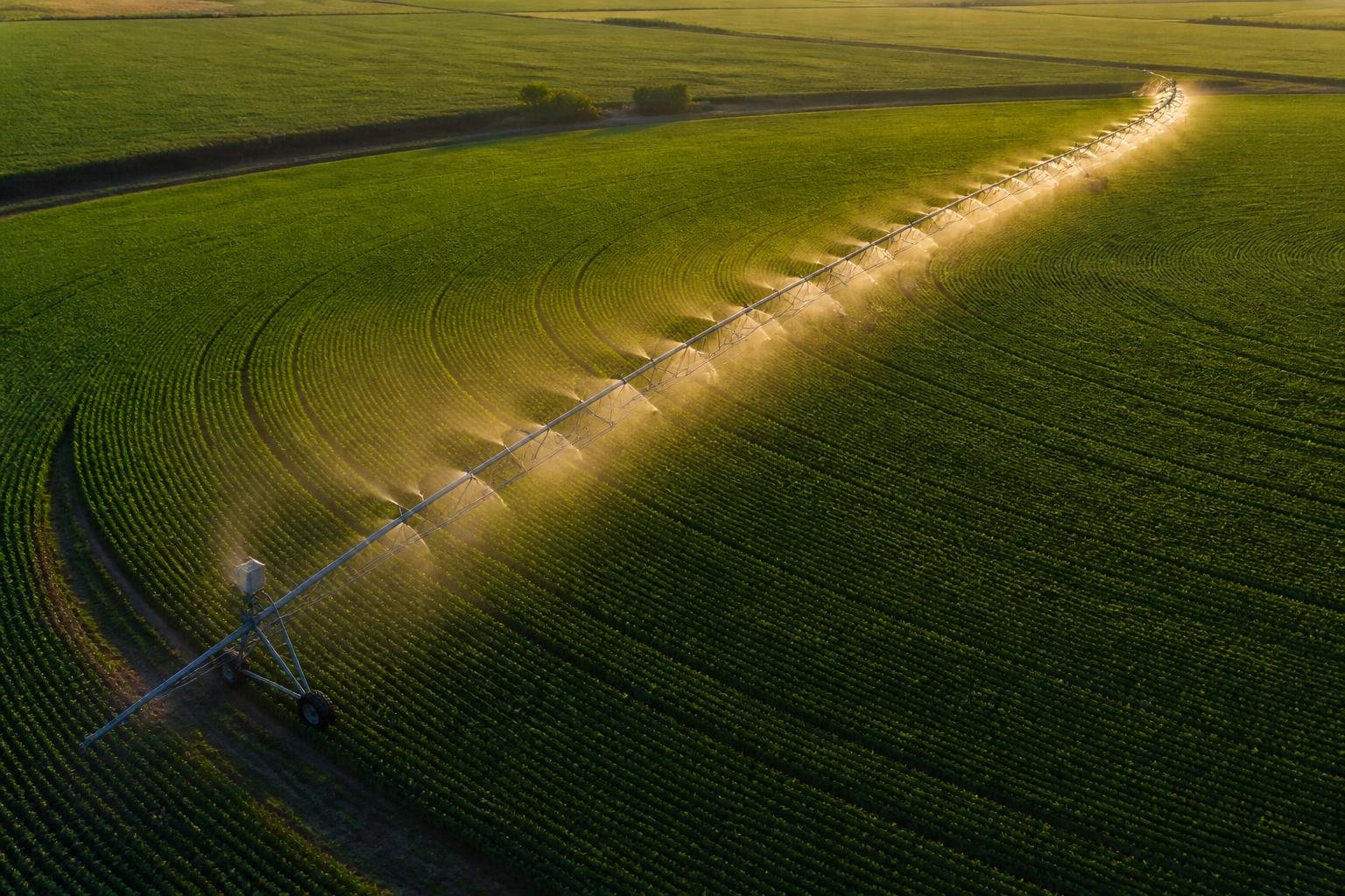 Aerial view of large center-pivot irrigation circle over row crops